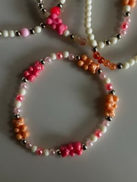 Image 6 of Pastel Gummy Bear Tumbler Bracelet Stack | Peach & Pink Cup Accessory