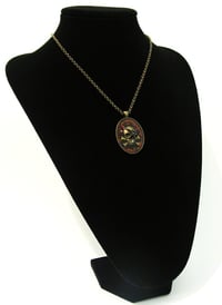 Image 4 of Ruby Rocks Skullie Bronze Pendant