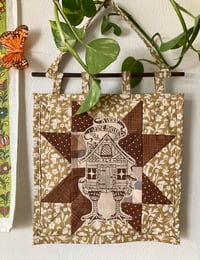 Image 1 of fine house quilted wall hanging