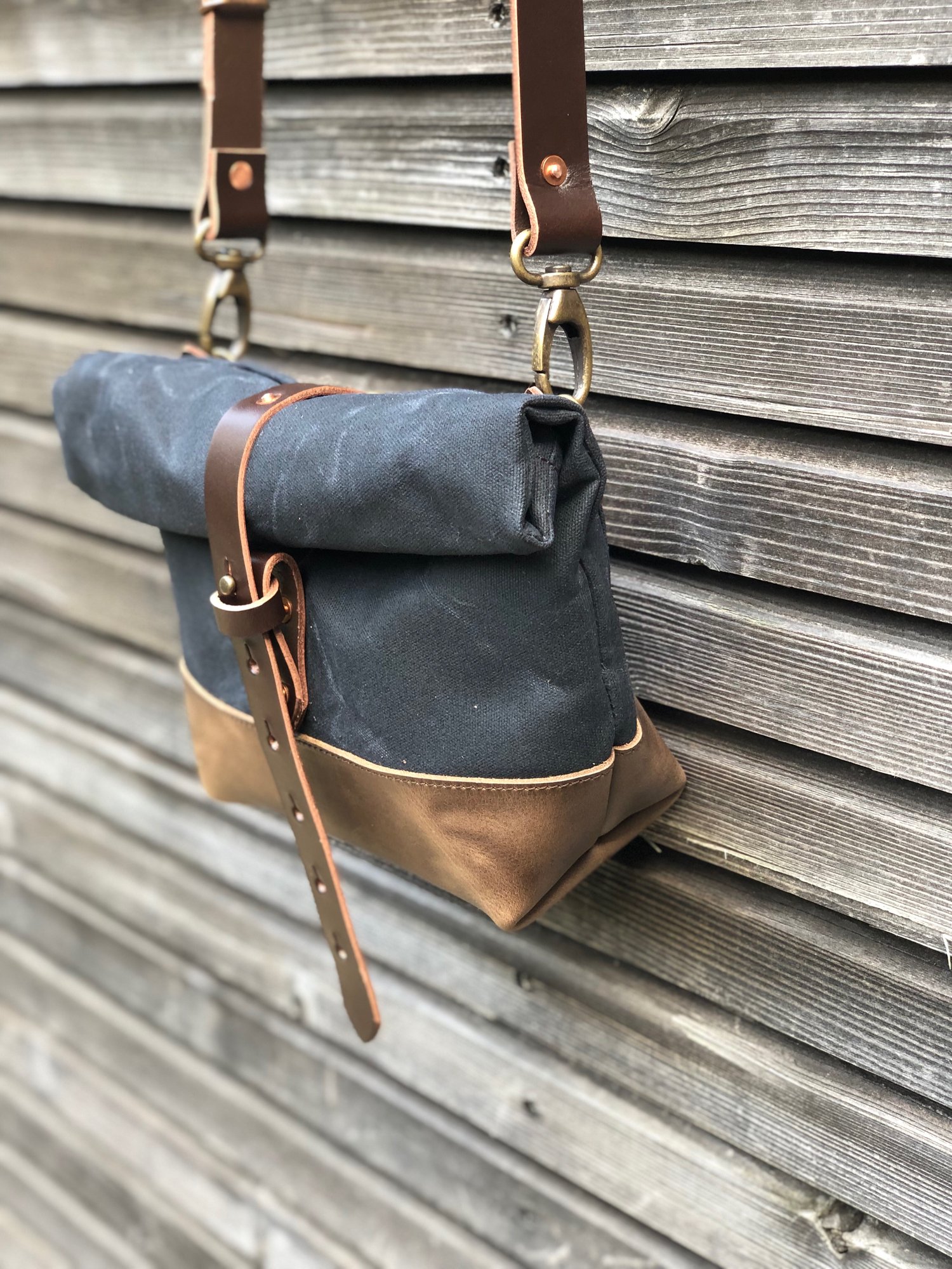 Image of Satchel in black waxed canvas with leather base