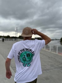 Image 1 of Smile at the world- tee