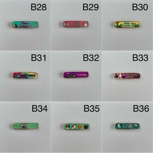 Image of Banner Enamel Pins