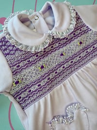 Image 2 of girls lilac smocked Babygrow 