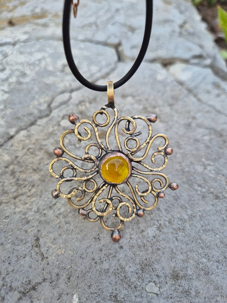 Curly sun pendant 