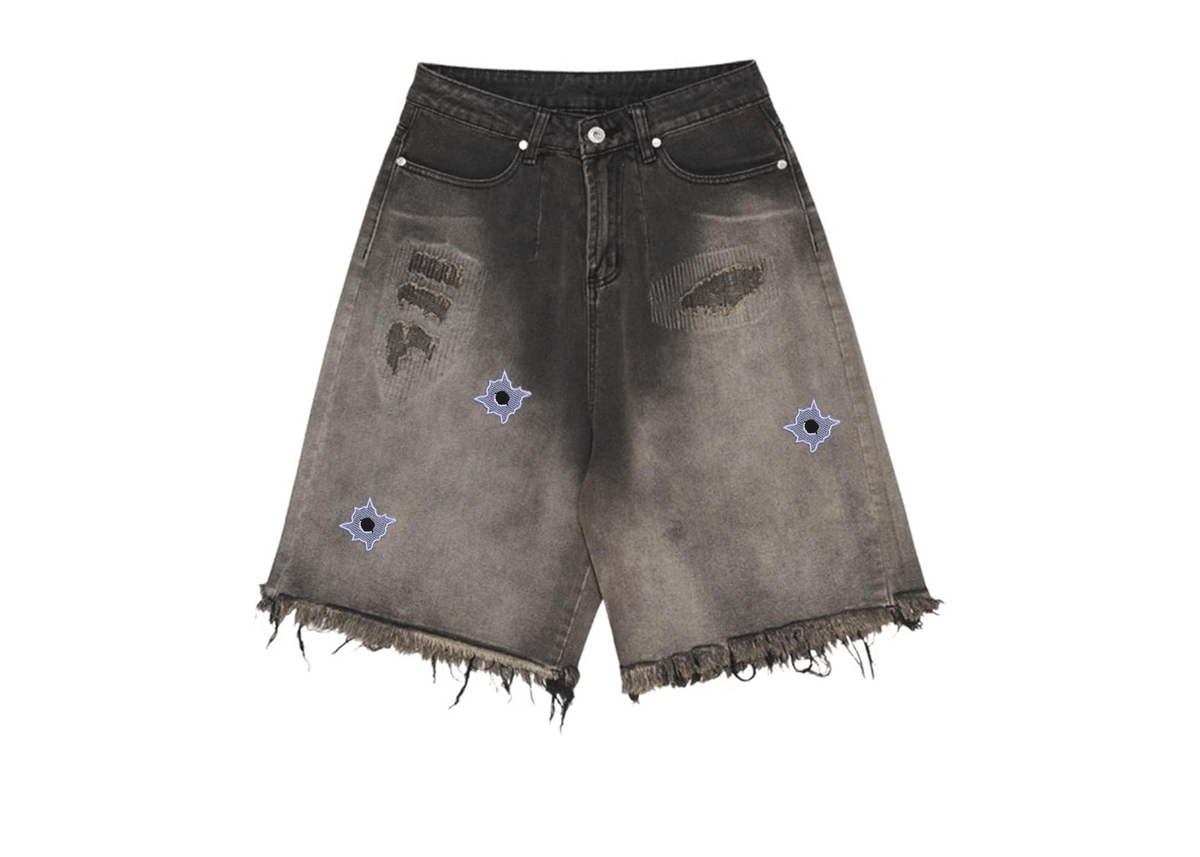 Image of DISTRESSED BULLET HOLE DENIM SHORTS