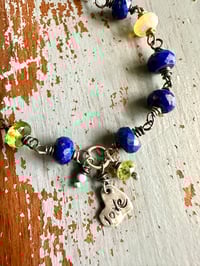 Image 10 of lapis and peridot charm bracelet