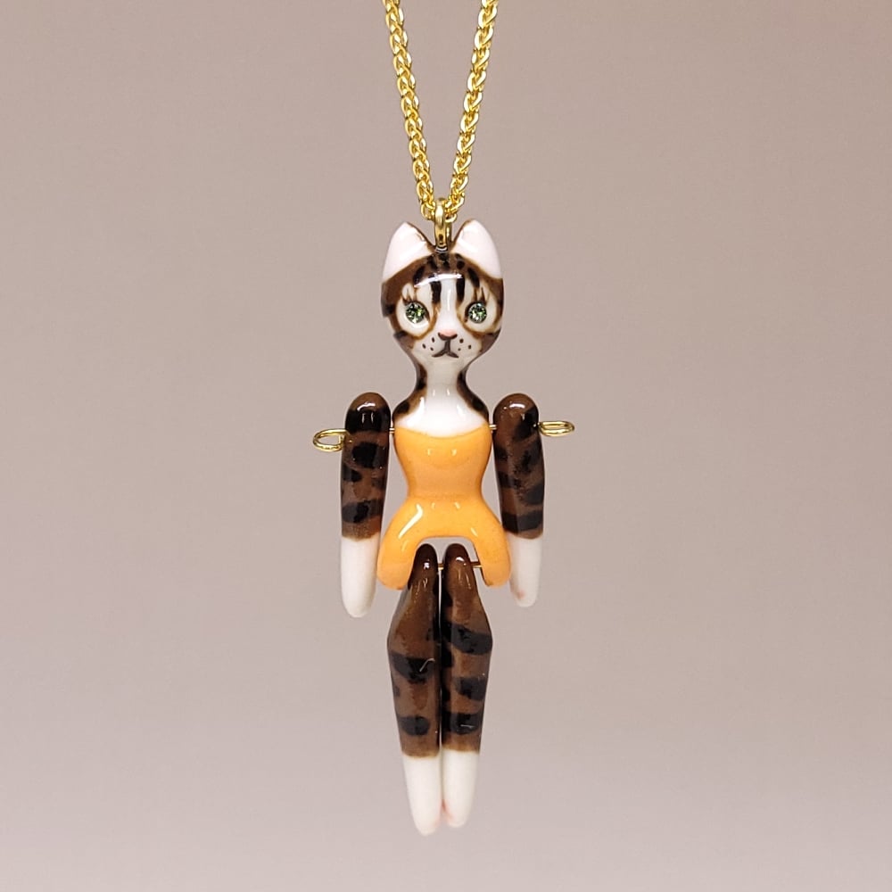 Image of Dark Brown Tabby Porcelain & Gold Vermeil Articulated Doll Pendant