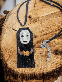 Image 1 of No Face necklace