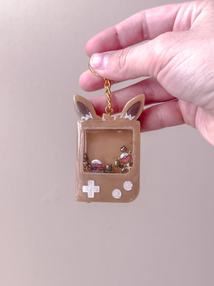 Image of Brown Poke Custom Resin Shaker Keychain 