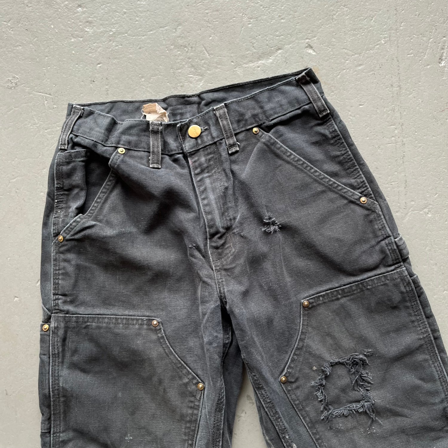 Image of Vintage Carhartt thrashed double knee jeans size 28/30
