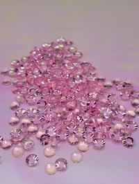 Image 3 of pink translucent nail stone