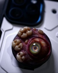 Image 13 of Teratoma, Glow bright eye, Swappable Phone Grip/Socket for smartphones