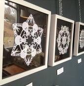 Image of Framed Hand-Cut Snowflakes