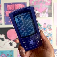 Image 1 of le sserafim fandom phone photocard holder.