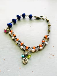 Image 1 of wire wrapped lapis and carnelian charm bracelet