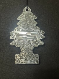 Image 1 of Cadillac emblem polished