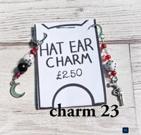 Image 23 of Ed’s hat ear charms