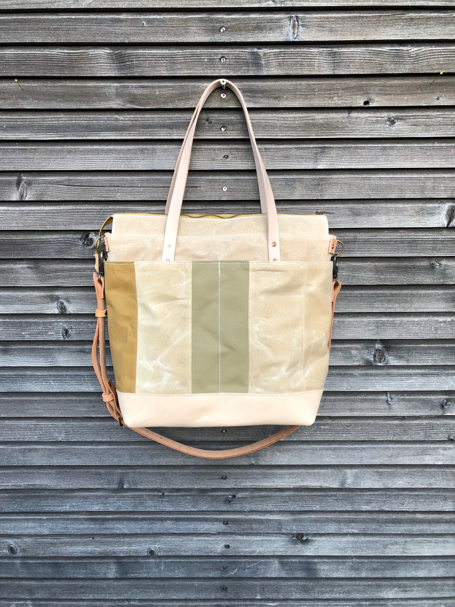Image of Diaper bag / Large tote bag in waxed canvas and leather with cross body strap COLLECTION UNISEX
