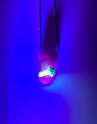 Image 2 of Glow in the dark mushie tongue pendant 2