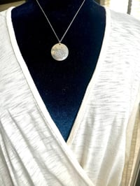 Image 14 of green sapphire pendant with handwritten quote