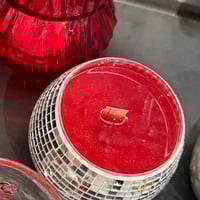 Image 4 of champagne pop scented disco ball candle