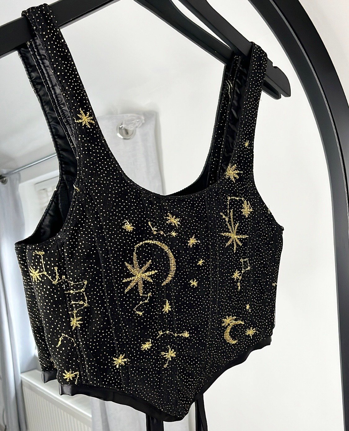 https://assets.bigcartel.com/product_images/82e3add2-2ea2-450e-b334-b485df747806/gold-embroidered-star-and-moon-corset.jpg?auto=format&fit=max