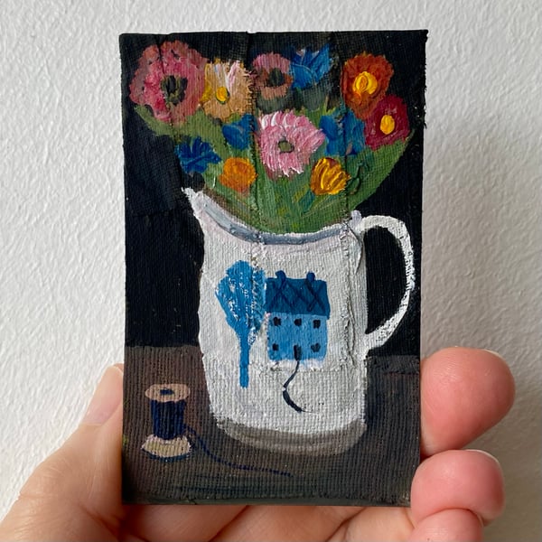 Image of blue cottage jug with summer flowers 