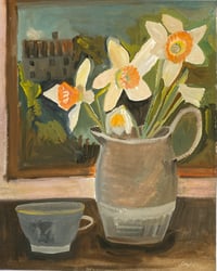 Pale daffodils by a landscape painting 