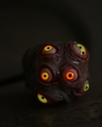 Image 2 of Egg of the King pendant, leather cord, brass hardware, all seeing glowing eyes