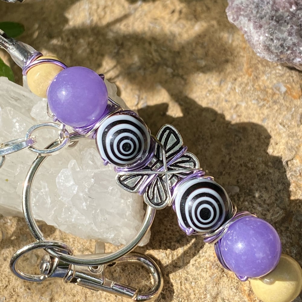 Image of lavender wings clip keychain 