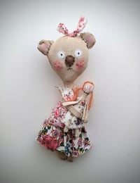 Image 1 of Bear and doll