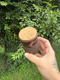 Image 2 of Black clay jar 