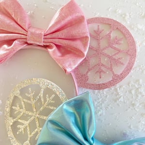 Image of Shimmer Snowflake Ears with Iridescent Bow 