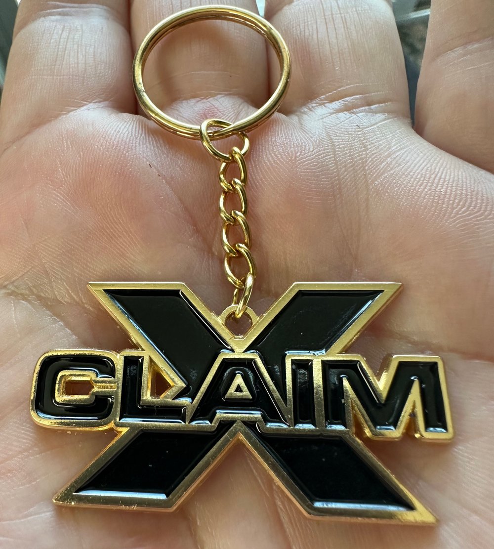 Shiny Gold “xclaim" logo metal Keychain