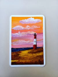 Image 1 of Pink Sunset lighthouse