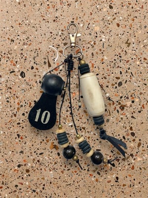 Image of PERFECT 10 BAG CHARM - CREAM/BLACK