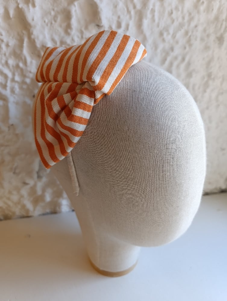 Image of Cerchietto non fiocco laterale righe bianco/arancione