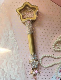 small gold star rattle