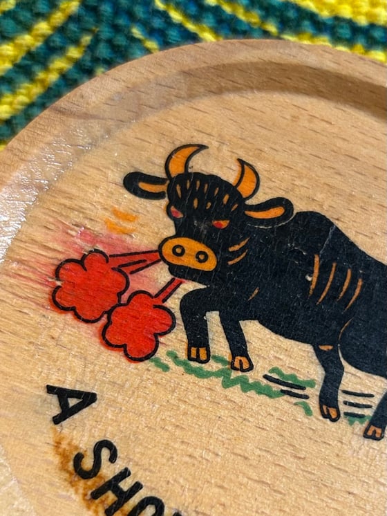 Image of vintage bull coaster