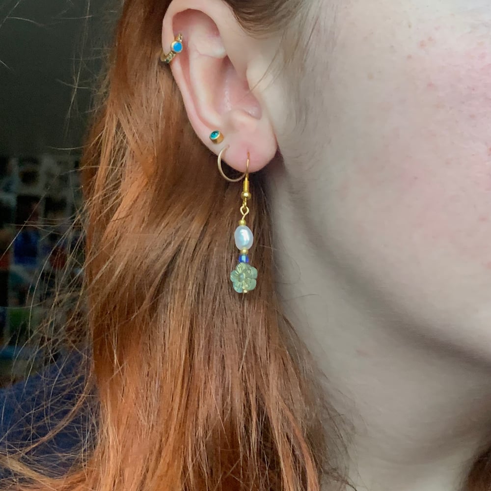 Image of blue n gold bead earrings