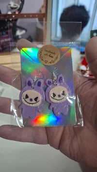 Purple labubu earrings 