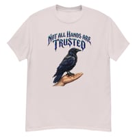 Image 7 of Trust Your Instincts Raven Unisex Graphic Tee – Gothic Raven & Hand Streetwear Design
