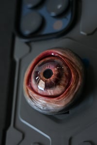 Image 10 of Custom Swappable Phone Grip for smartphones, reflective pupil, green glow in the dark