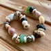 Image of Huilau (mixed) Hawaiian shell bracelet with a Tahitian pearl and seaglass size 7 1/2