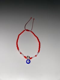 Image 1 of Red/White blue evil eye bracelet 