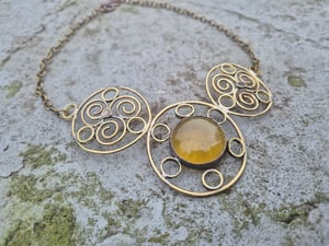 Sun necklace with yellow centre 