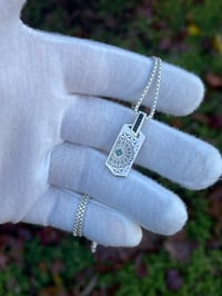Image 1 of Micro Tag 