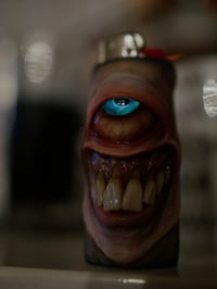 Image 10 of Faded Face Bic Lighter Sleeve