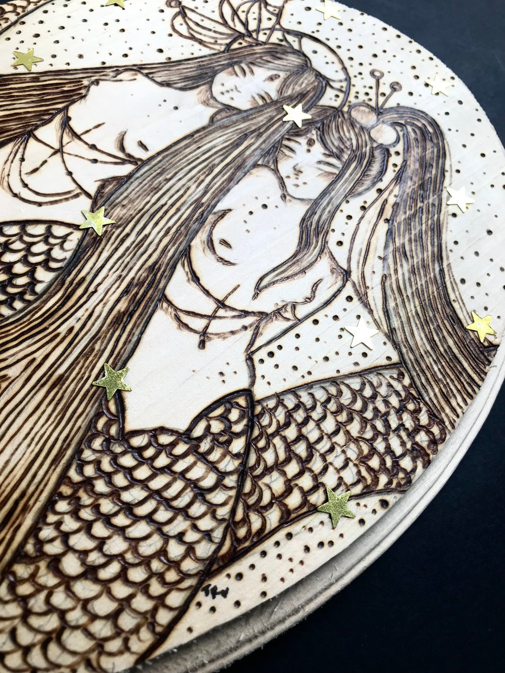 “Elysian” wood burning 