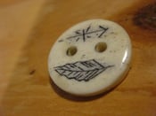 Image of scrimshaw cow bone button